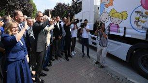 TRUCKS CARRYING EDUCATION MATERIALS FOR KINDERGARTEN AND PRESCHOOL CLASS STUDENTS TOOK THE ROAD